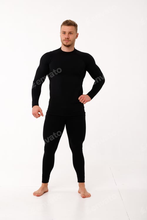 Preview: A man with a sporty physique in thermal underwear.