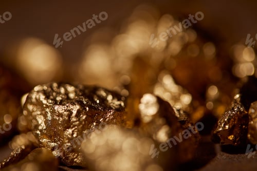 Preview: selective focus of golden stones with blurred background