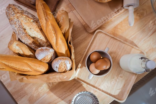 Preview: Baking Supplies and Tools on the Kitchen Table, Great for Cooking and Baking Projects