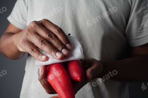 Preview: Cleaning red chili peppers in the kitchen