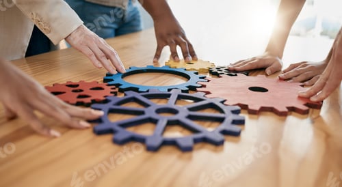 Preview: Hands, collaboration and gear with a business team working together in synergy for innovation at a