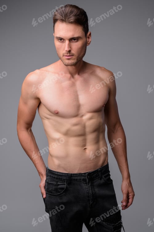 Preview: Studio shot of handsome muscular man shirtless