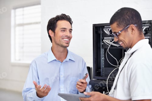 Preview: You make IT so simple. A young IT specialist ready to fix a server.