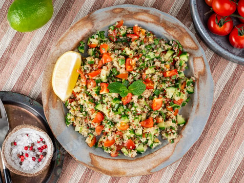 Preview: Tabbouleh salad with quinoa. Eastern food with vegetables mix, vegan diet. Top view