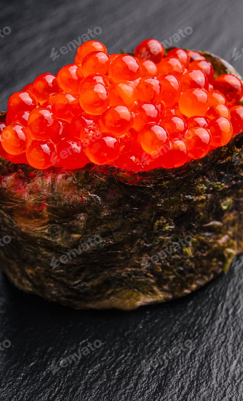 Preview: Gunkan ikura with caviar on a black background