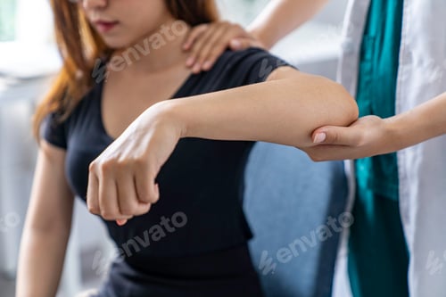 Preview: The doctor counsels the patient about pain in the muscles of the arms and elbows. office syndrome pr