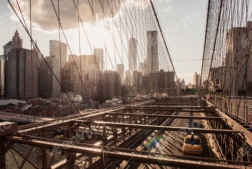 Preview: Golden hour over the bustling city viewed from the iconic bridge.