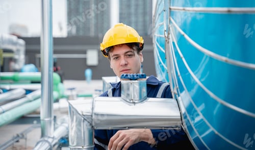 Preview: Industrial Professionals Ensuring Efficiency in HVAC Systems.