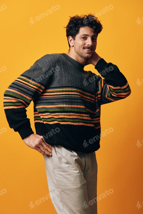 Preview: Man smile sweater orange face lifestyle happy trendy fashion student expression portrait background
