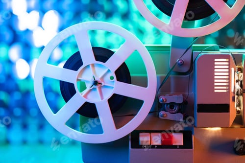 Preview: Retro reel with film rotating on colorful shining sparkles wall. Old-fashioned 8mm film projector