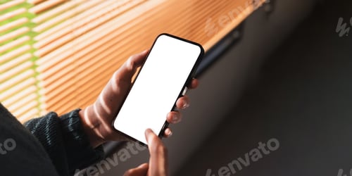 Preview: Woman holding blank screen mock up mobile phone. Mobile gadget concept