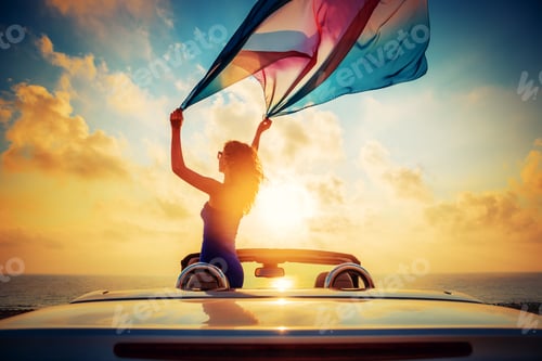Preview: Silhouette of young woman relaxing on the beach
