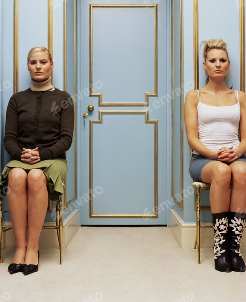 Preview: Two women on opposite sides of a doorway