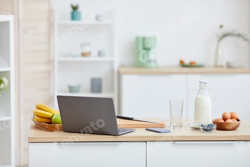 Preview: Kitchen table with laptop