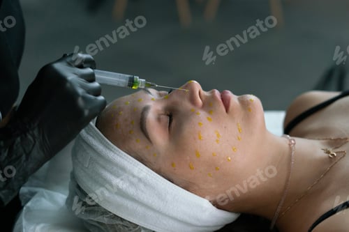 Preview: A skilled cosmetologist applies a face peeling treatment