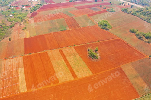 Preview: Dry ground rough cracks in the land with sand in factory industry for construction site.