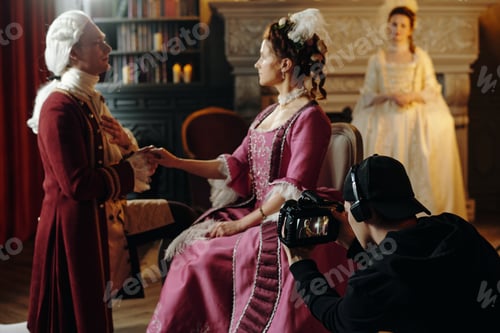 Preview: Caucasian Young Adult Man Kneeling before Caucasian Woman during Baroque Filming