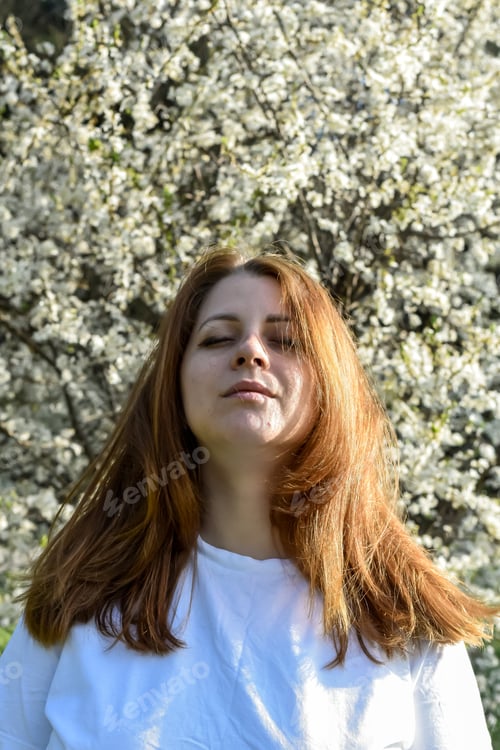Preview: Portret of woman in white shirt on yellow background