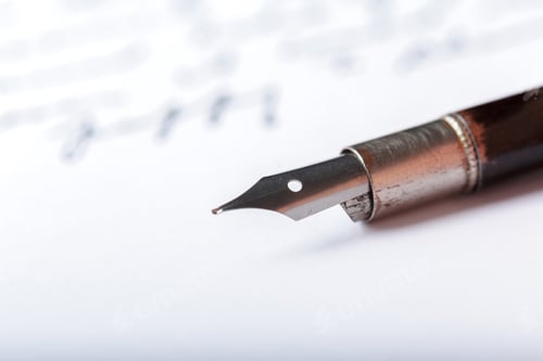Preview: Fountain pen resting on white paper with handwritten notes