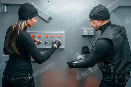 Preview: Two robbers in uniform trying to break vault lock