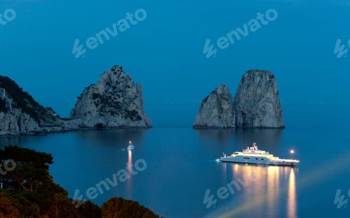 Preview: Faraglioni by night, famous giant rocks, Capri island