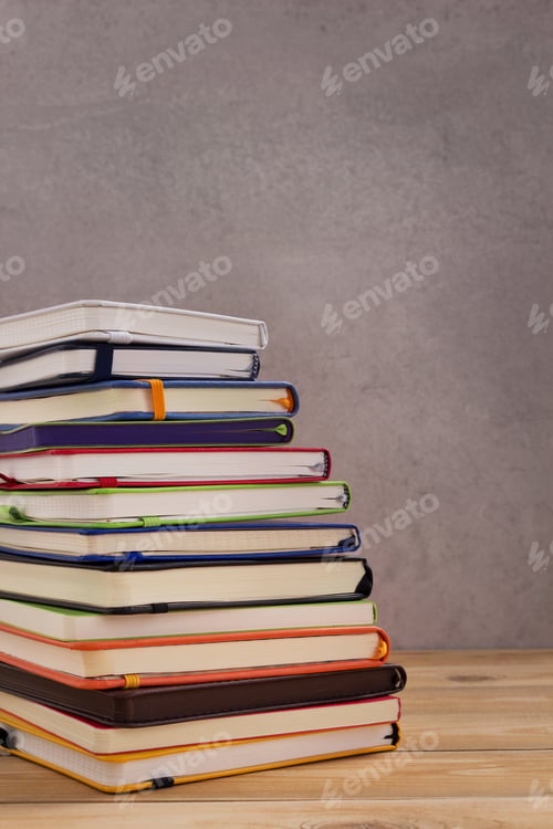Preview: notepad or paper notebook at wooden table