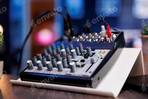 Preview: Sound mixer placed on desk in empty room