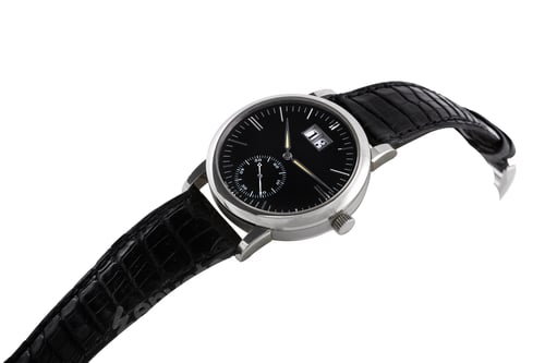 Preview: Closeup shot of a modern black wristwatch on a white background
