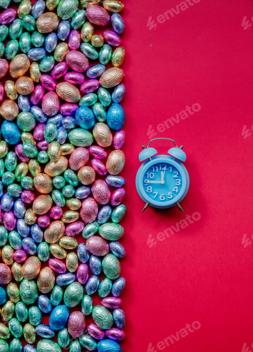 Preview: color Chocolate Easter eggs and alarm clock