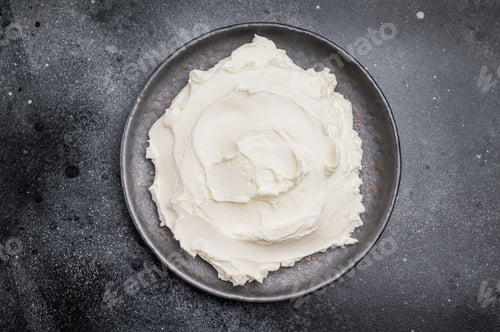 Preview: Creamy Homemade Mascarpone cheese, cream cheese. black background. top view