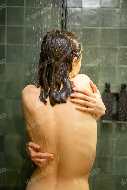 Preview: Woman taking shower and soaping the body with shower gel
