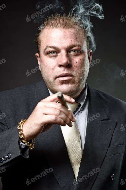 Preview: Gangster Mafia Man In Suit With Tie Looking Tough Isolated On Dark Background