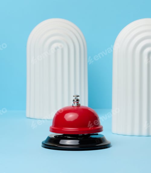 Preview: Metallic red bell to call staff on a blue background