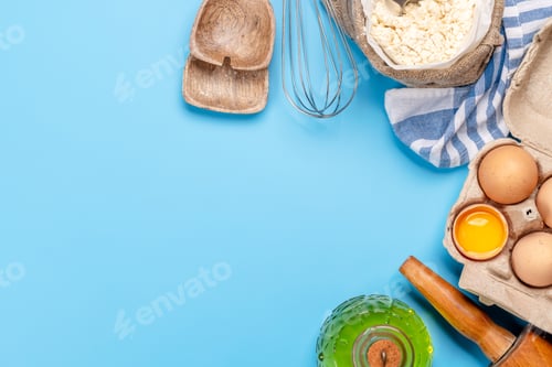 Preview: Cooking ingredients and utensils on blue background