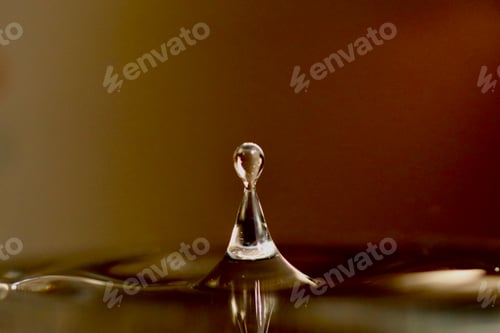 Preview: Water droplet hitting the surface of water