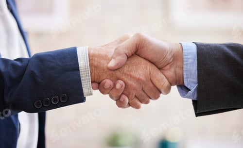 Preview: A firm handshake shows you mean business. Shot of two unrecognizable businesspeople shaking hands.
