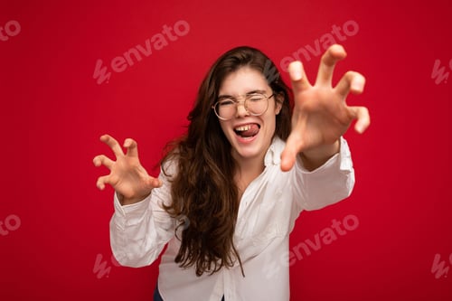 Preview: Portrait of young emotional positive sexy beautiful brunette woman with sincere emotions wearing