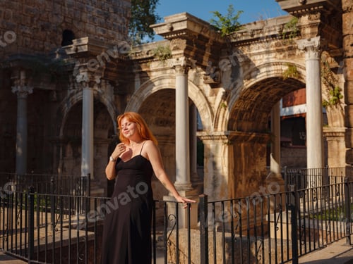 Preview: Young woman walking in old town, Antalya, Turkey