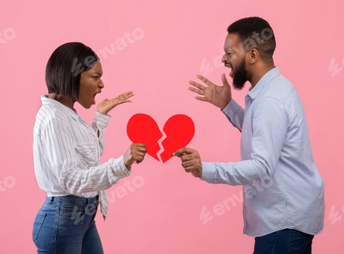 Preview: Angry young guy and lady with red heart cut in half shouting at each other, having conflict or fight