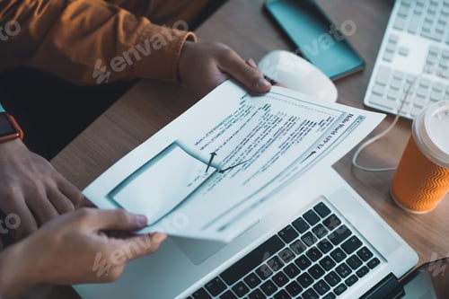 Preview: Sheet of paper being in male hands