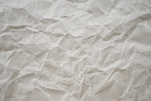 Preview: Crumpled brown paper texture background.