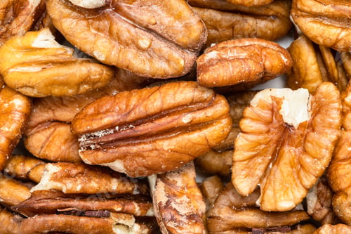 Preview: background - many shelled pecan nuts