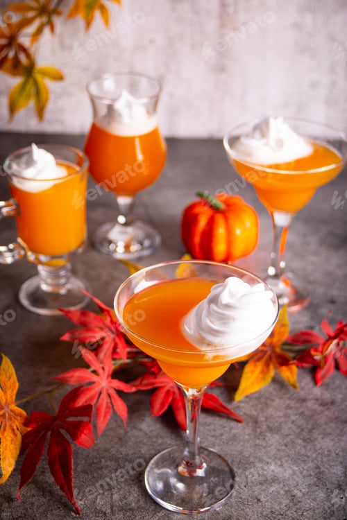 Preview: Pumpkin fall seasonal drink cocktail latte with spices and whipped cream