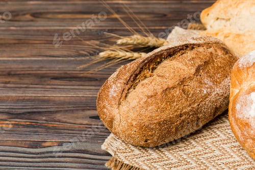 Preview: Homemade natural breads. Different kinds of fresh bread as background