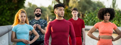 Preview: portrait of multiracial sports team of friends ready to train