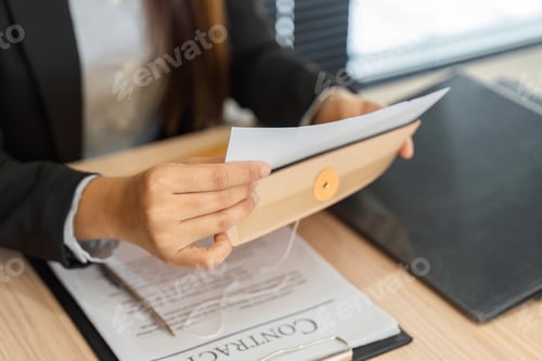 Preview: Legal Workflow and Document Handling. A professional organizing contract paperwork efficiently.