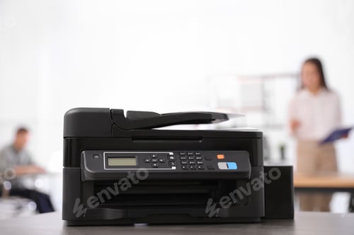 Preview: New modern printer on table in office
