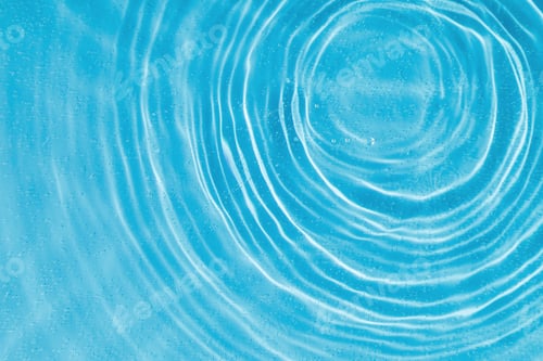 Preview: drops on water with circles on a blue background