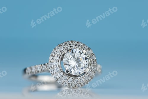 Preview: Closeup of double halo diamond engagement ring studio shot