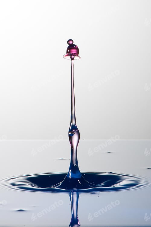 Preview: Splash of colorful liquid with high speed flash